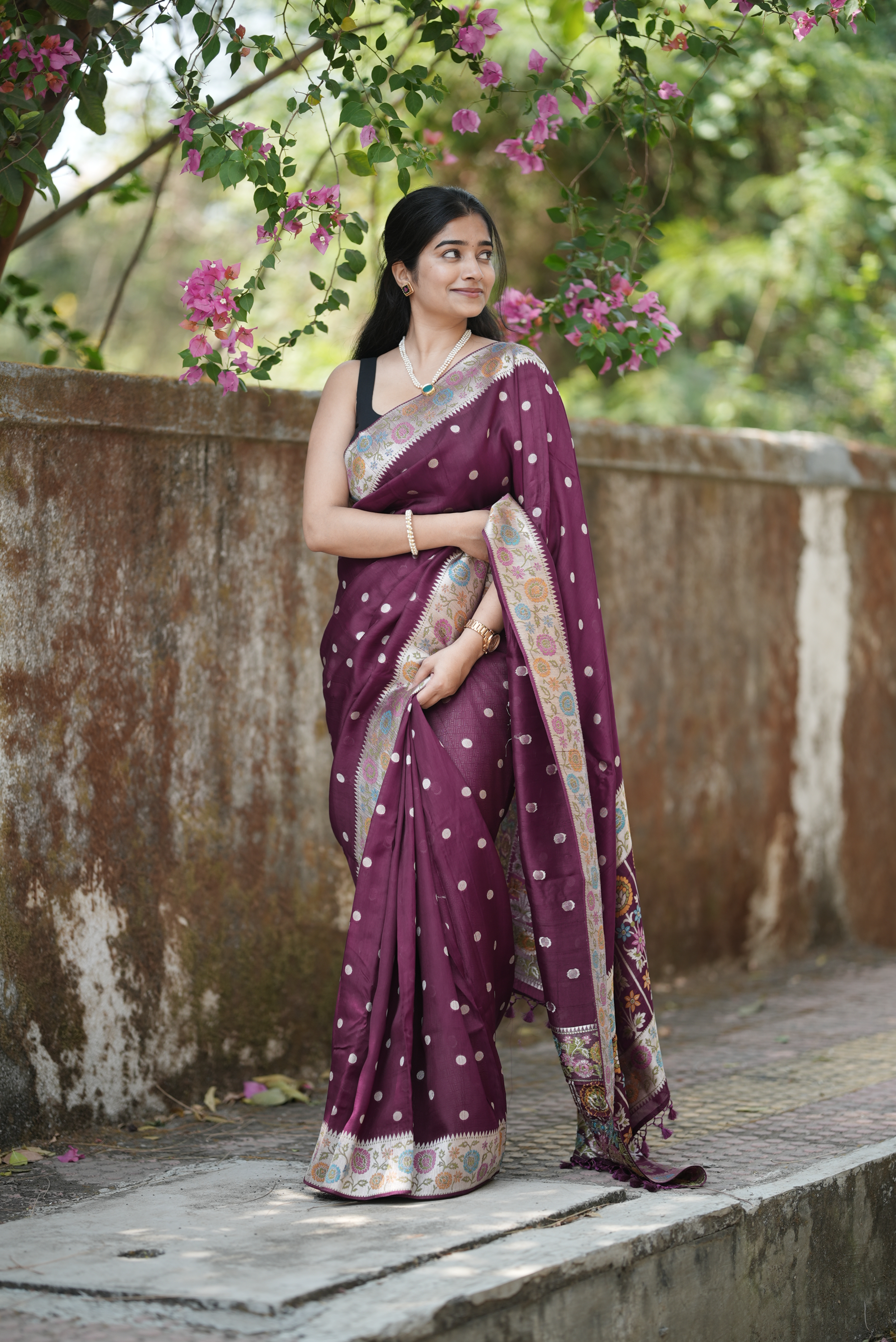 Wine embroidered soft tussar silk saree with circular buttas and floral border