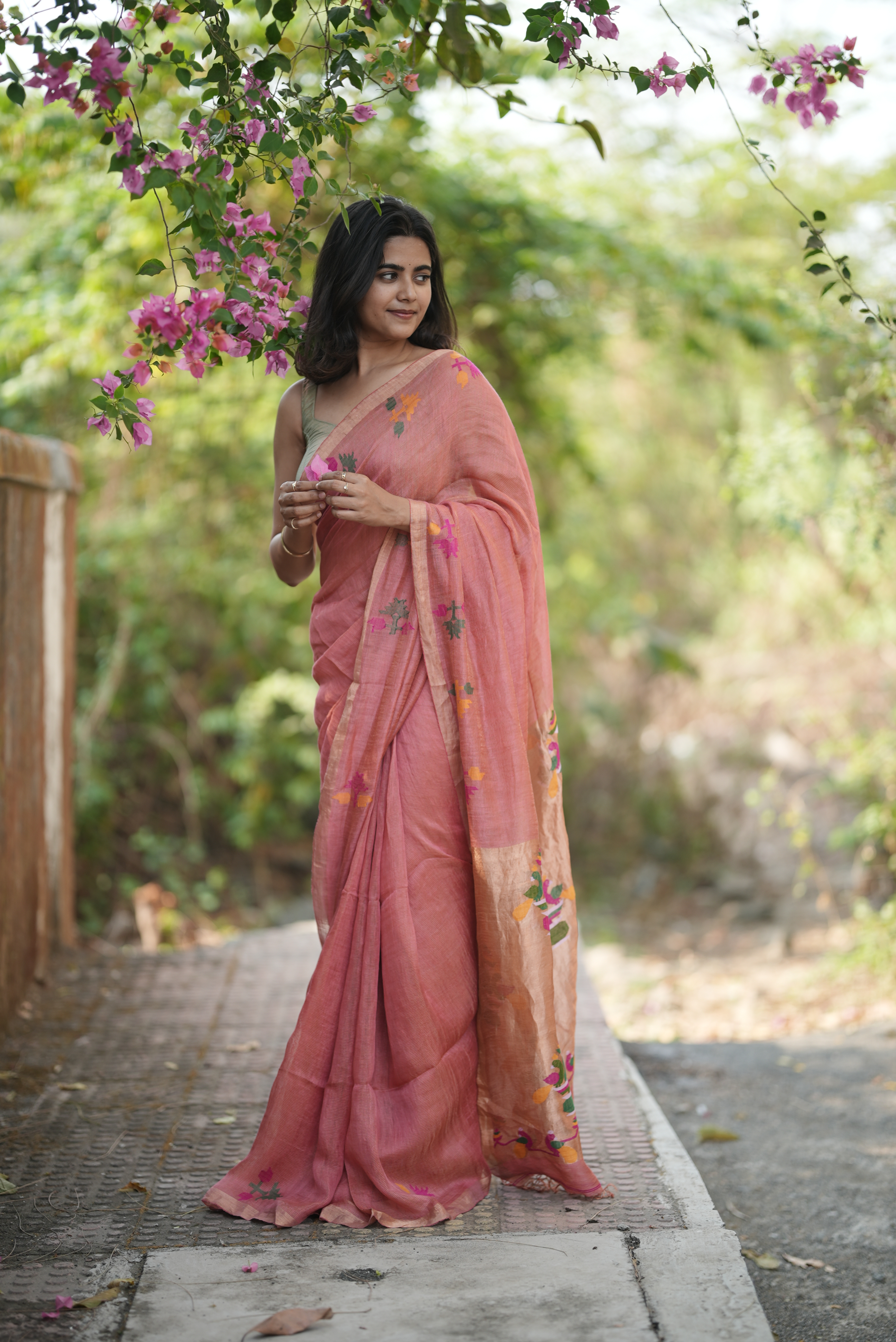 Peach pink silk linen paithani with detailed peacock pallu