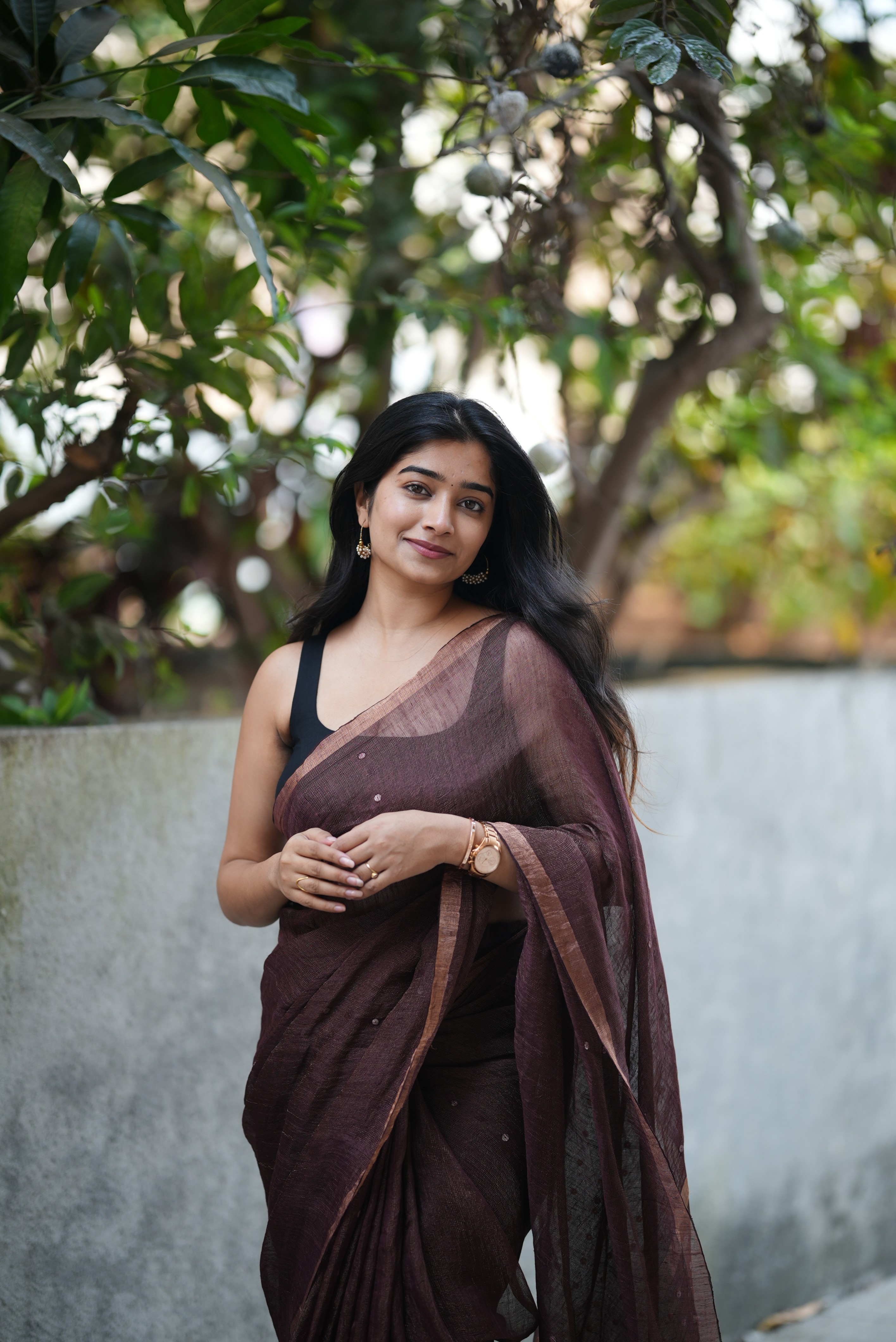 Rich chocolate brown Masline silk saree with subtle sequins—sheer elegance for a classy, modern look
