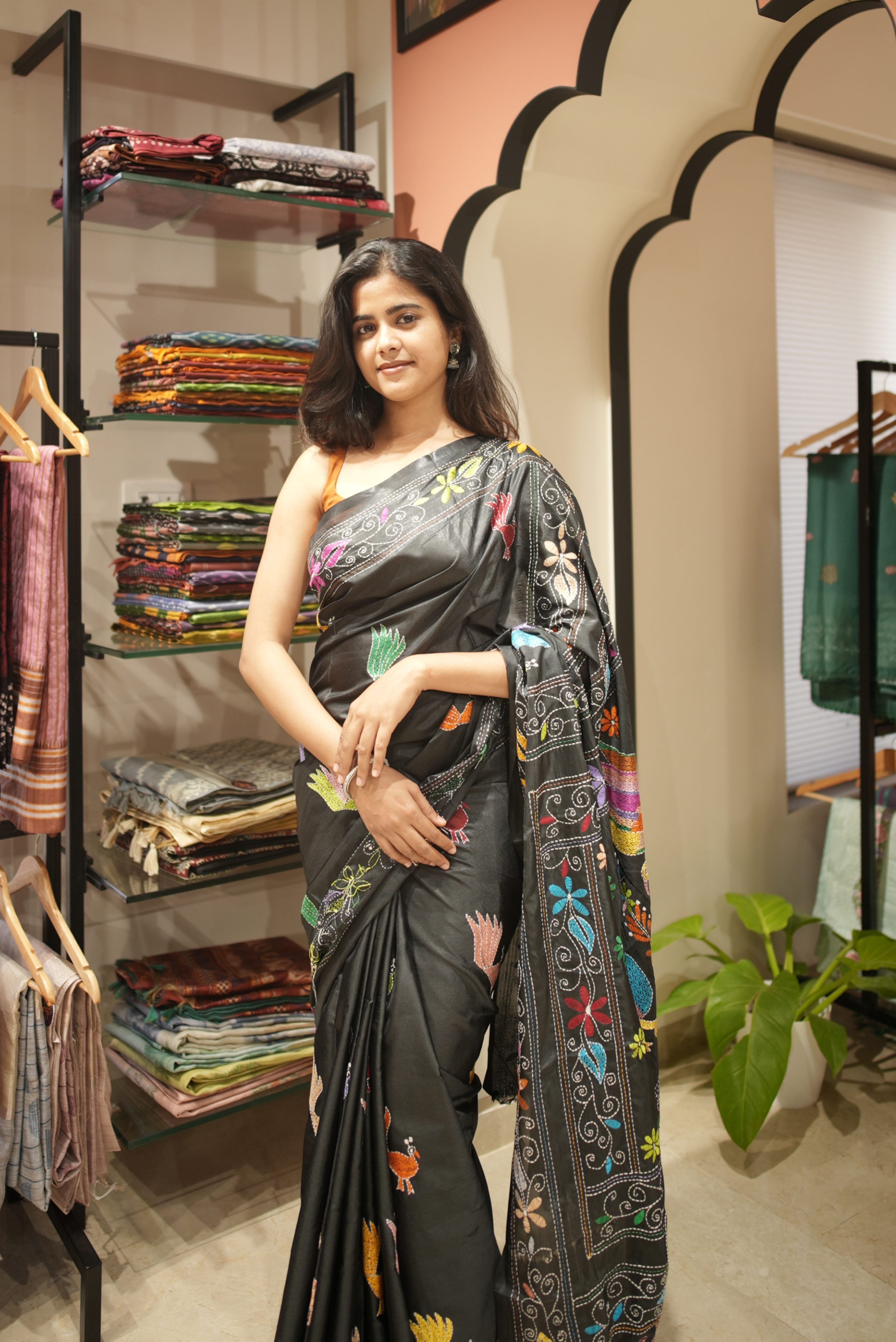 Black blended silk adorned with intricate hand Kantha work saree