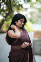 Rich chocolate brown Masline silk saree with subtle sequins—sheer elegance for a classy, modern look