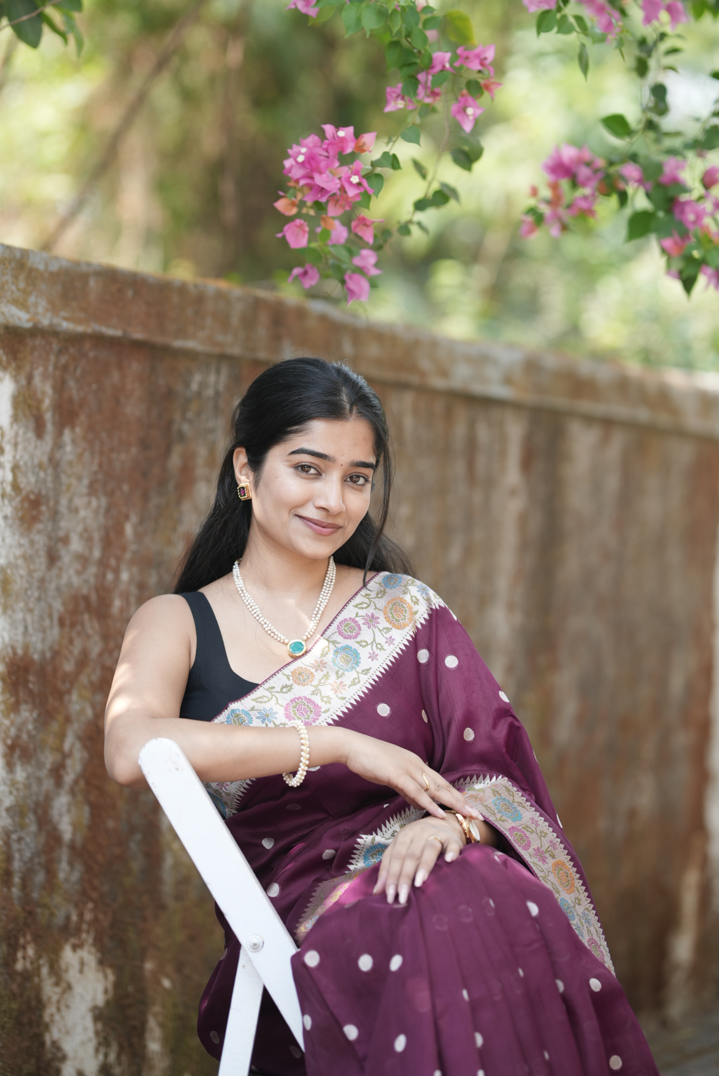 Wine embroidered soft tussar silk saree with circular buttas and floral border