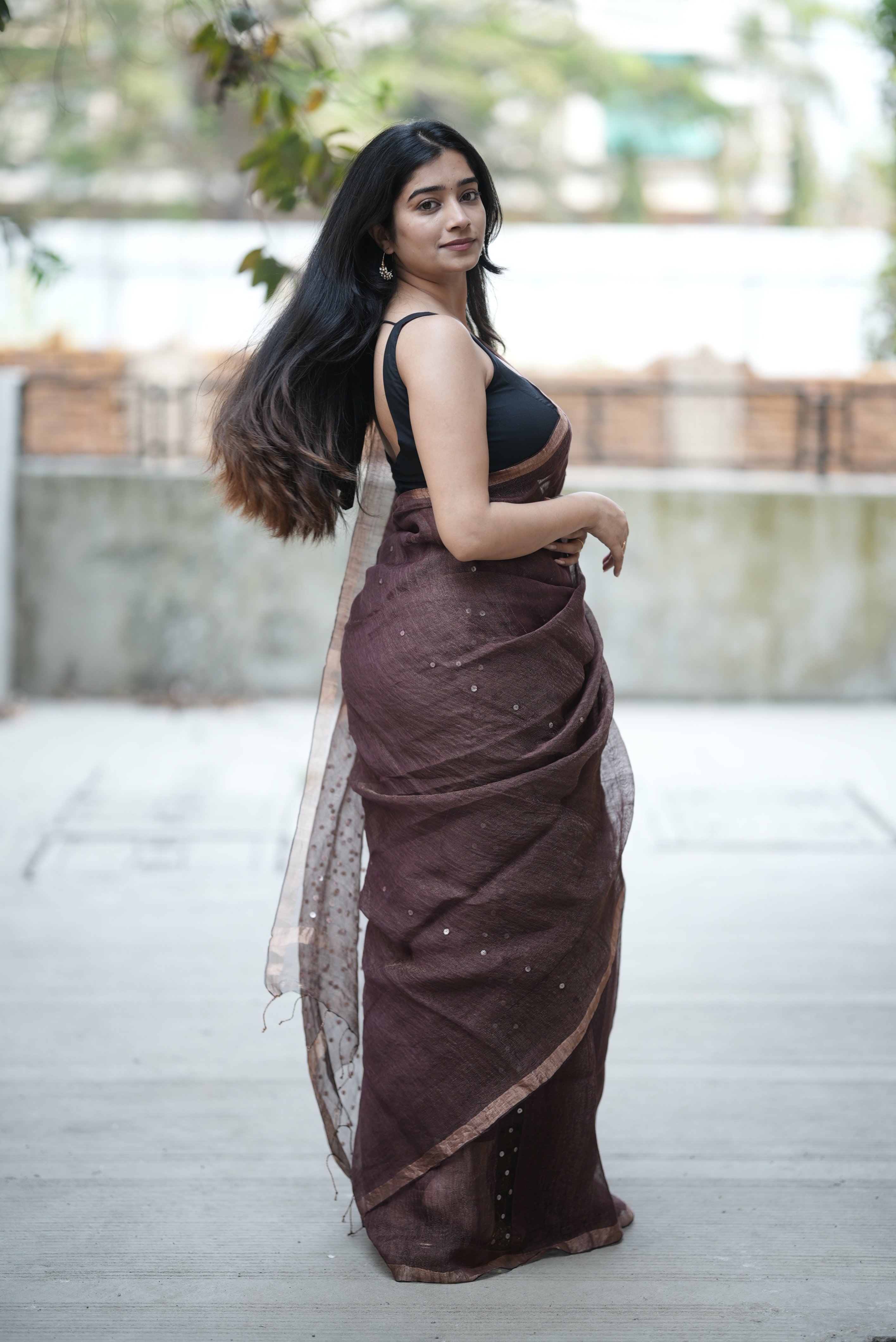 Rich chocolate brown Masline silk saree with subtle sequins—sheer elegance for a classy, modern look