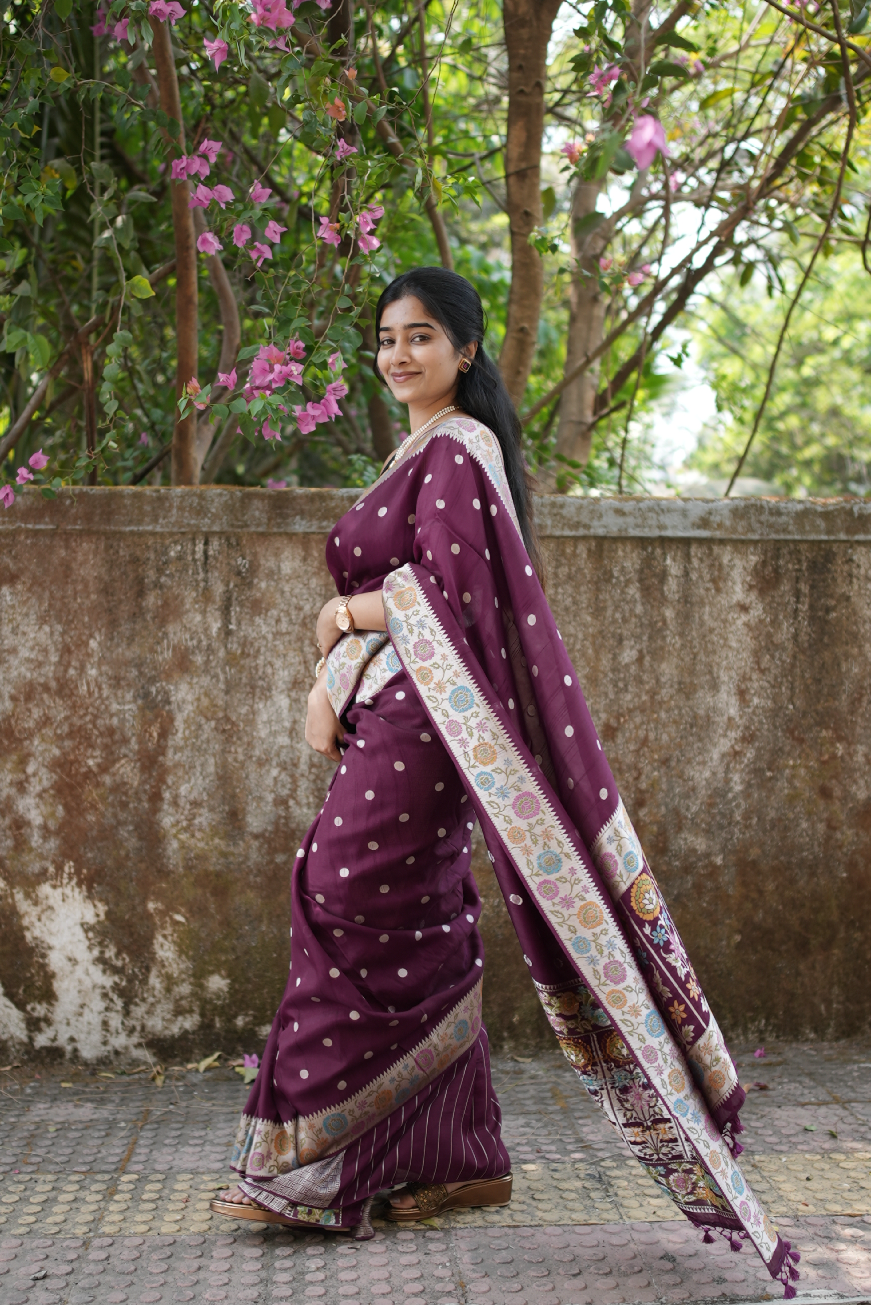 Wine embroidered soft tussar silk saree with circular buttas and floral border