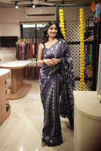 Purple blended silk adorned with intricate hand Kantha work saree