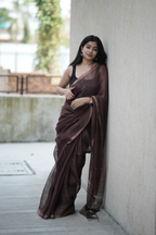 Rich chocolate brown Masline silk saree with subtle sequins—sheer elegance for a classy, modern look