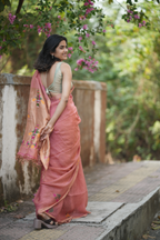 Peach pink silk linen paithani with detailed peacock pallu