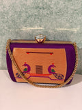 Tradition in every weave, elegance in every detail. This handcrafted Paithani clutch is the perfect festive companion.