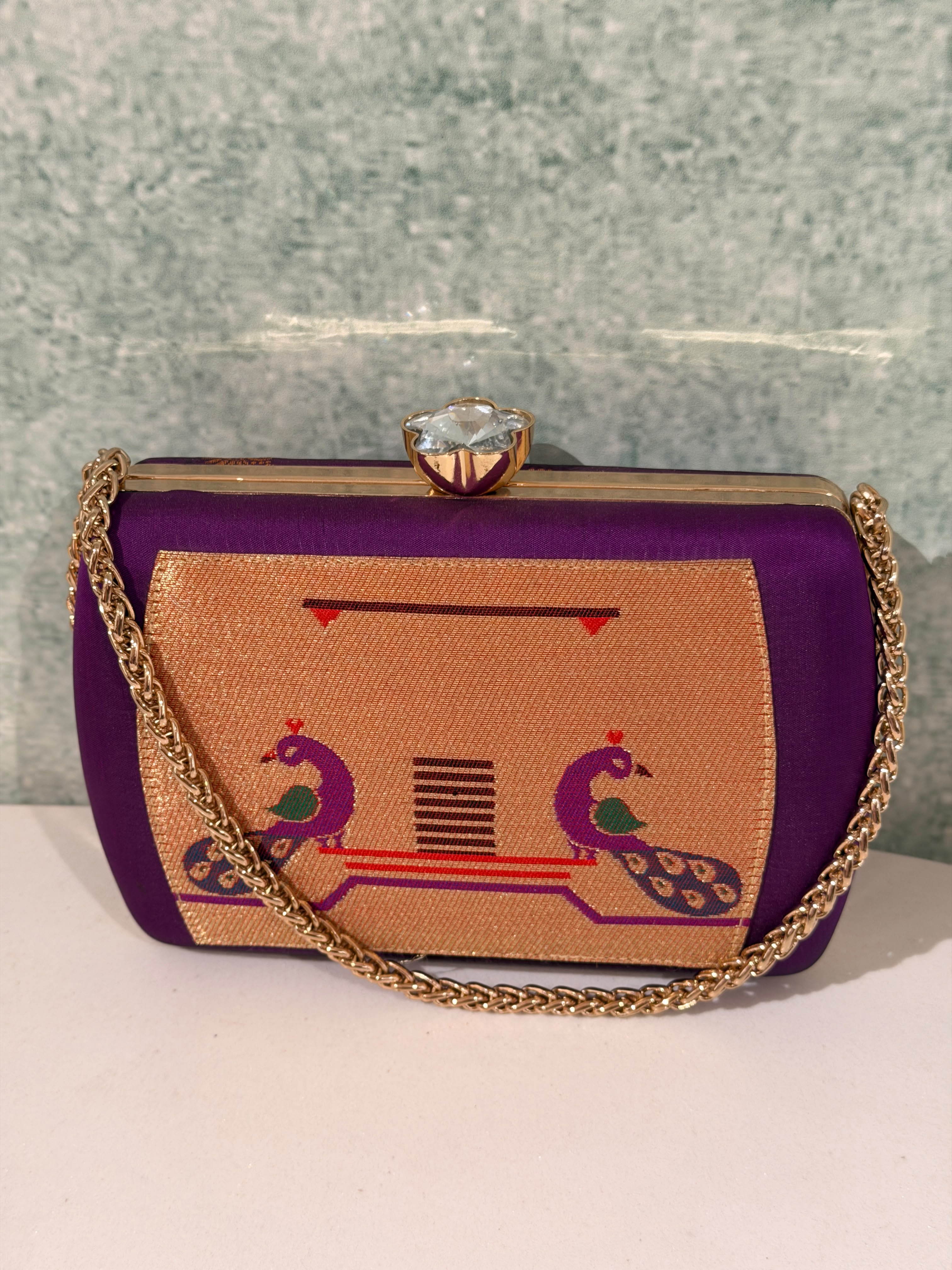 Tradition in every weave, elegance in every detail. This handcrafted Paithani clutch is the perfect festive companion.
