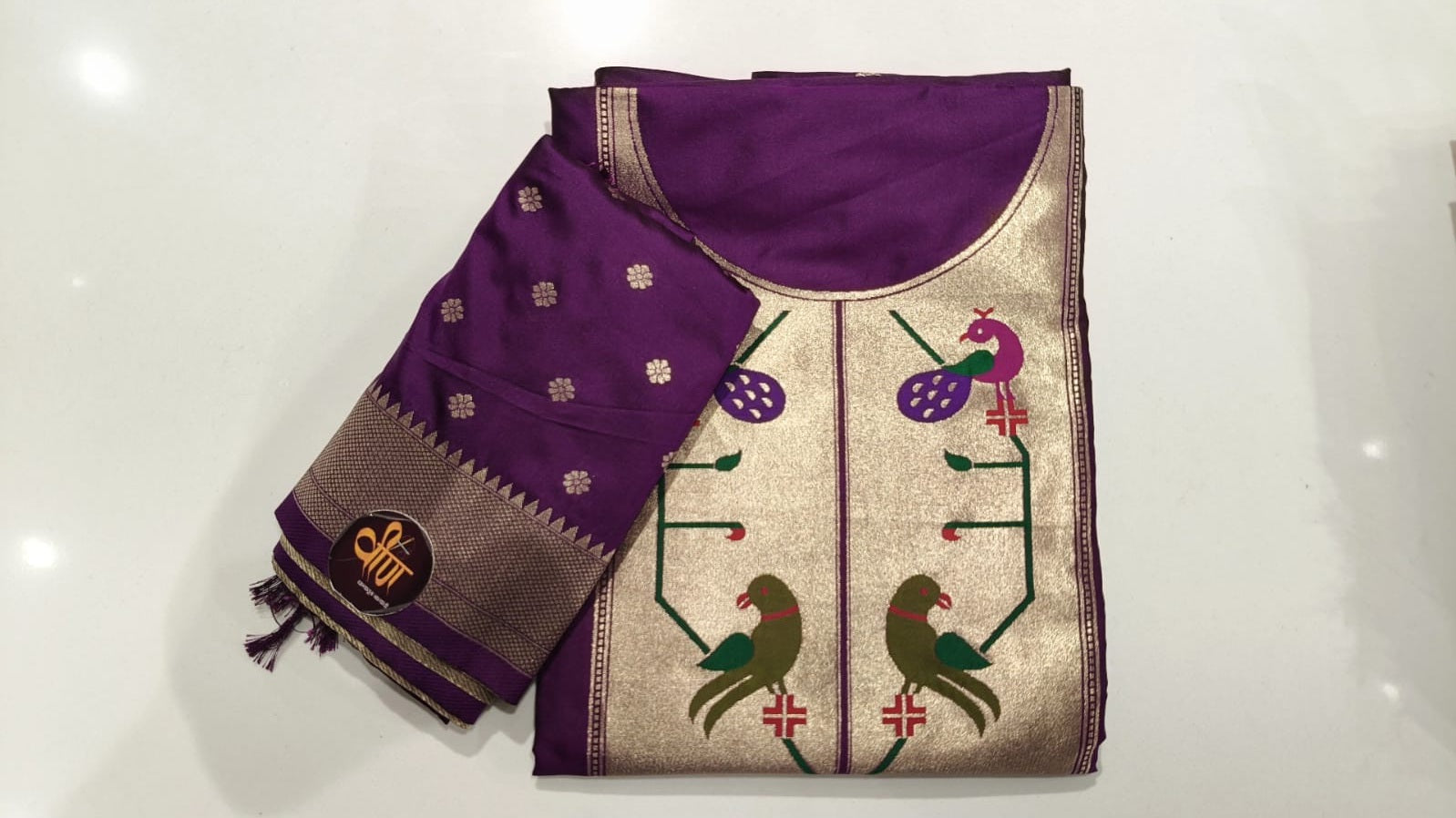 Rich Paithani weaving, vibrant peacock motifs, and royal charm—all in one beautiful dress material. ❤️