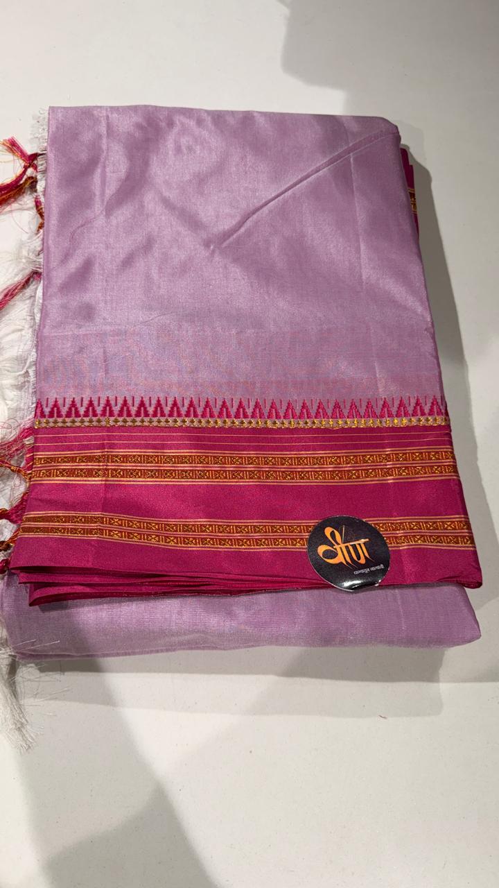 Grace meets everyday comfort with this elegant Cotton Temple Border Saree. Featuring a soothing  body paired with a rich  temple border accented with fine golden zari detailing.