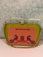 Tradition in every weave, elegance in every detail. This handcrafted Paithani clutch is the perfect festive companion.